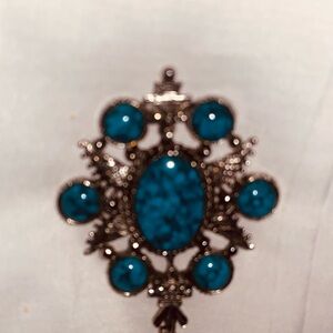Elegant Silver and Blue Brooch
